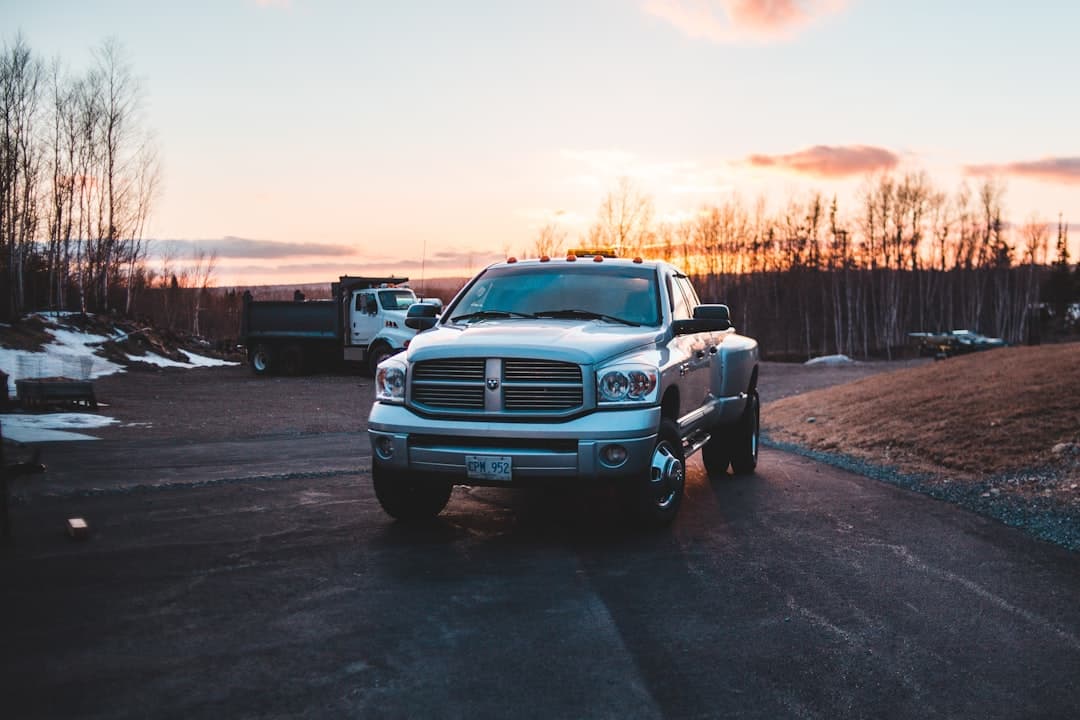 A work truck on the road at dusk