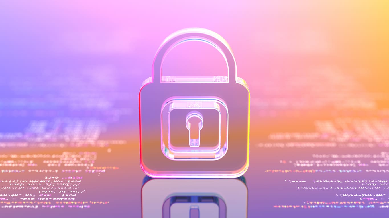 A translucent padlock icon, symbolizing robust security, stands centrally against a gradient background of pink, orange, and purple hues. The padlock is slightly reflective, and snippets of code in white text appear scattered around the image.