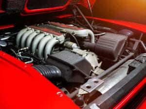 Egy Ferrari motor az aszimmetrikus marketingmotor szemléltetésére