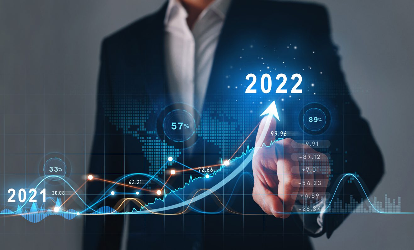 A person in a suit points at a glowing 2022 number on a rising graph. The background features various charts, graphs, and data points, highlighting financial growth and progress from 2021 to 2022, illustrating the impact of CPQ software in driving these gains.