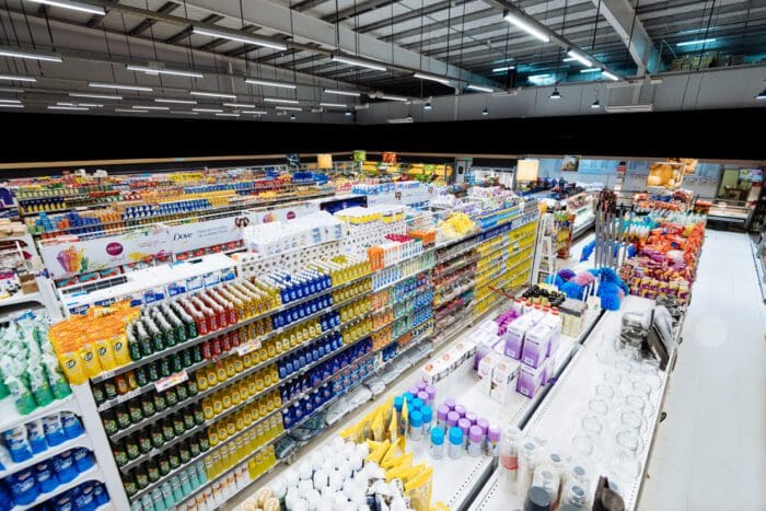 Well-stocked supermarket aisles with diverse products