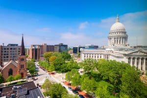 Aerial view of cityscape with capitol building and church