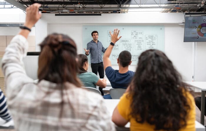 Manager teaching course in a classroom