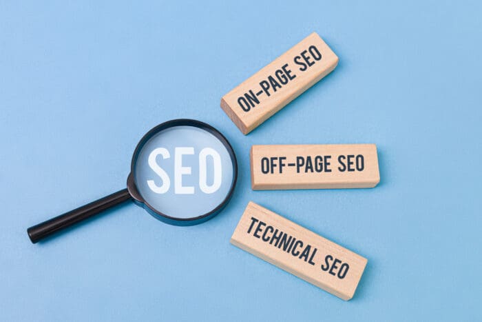 Magnifying glass highlighting SEO strategies