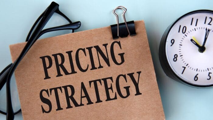 Pricing strategy concept with clock and glasses.