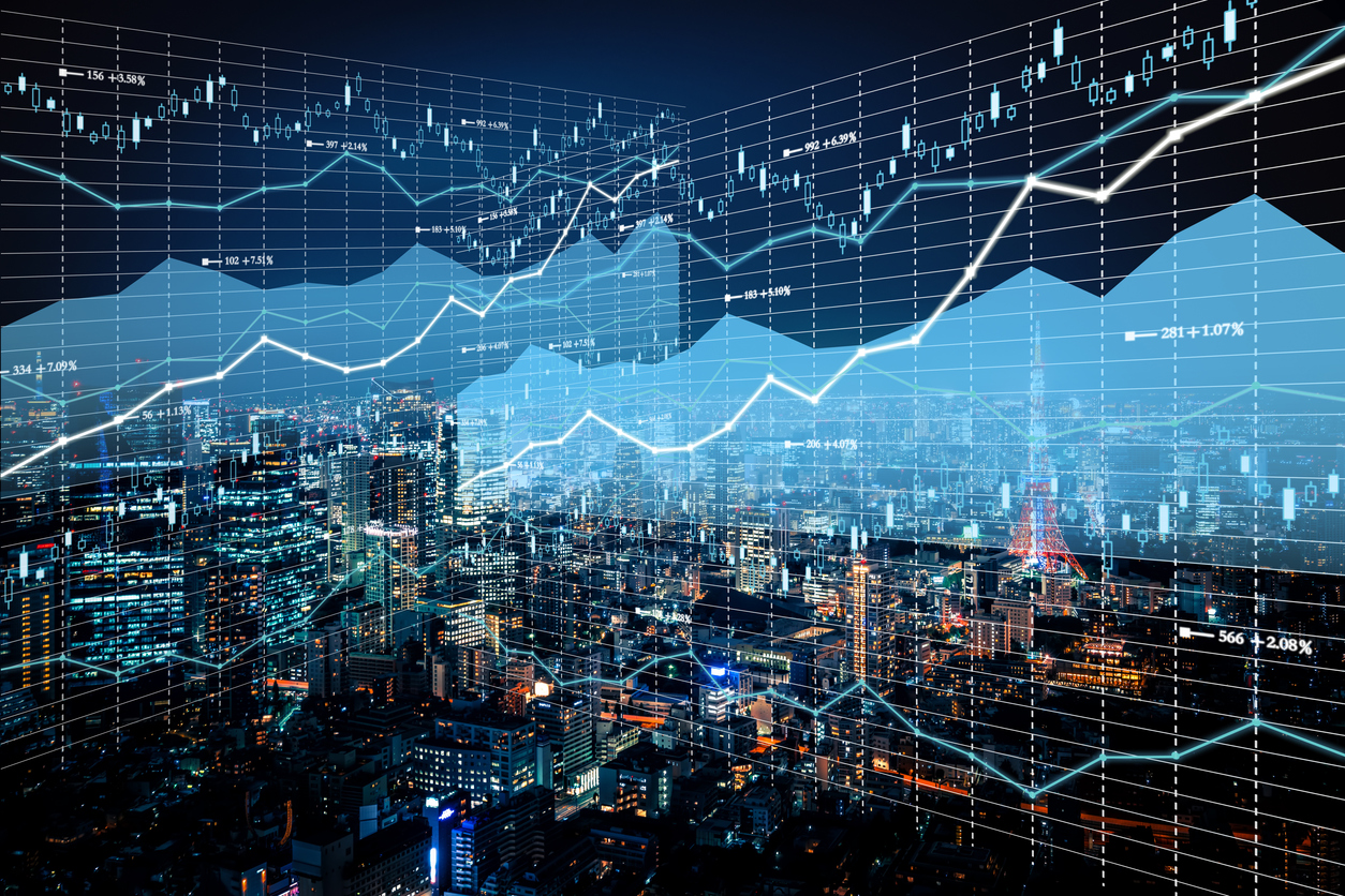 A futuristic cityscape at night features skyscrapers illuminated by vibrant lights. Translucent graphs and charts overlay the scene, suggesting marketplace intelligence and data analysis intertwined with stock market trends.