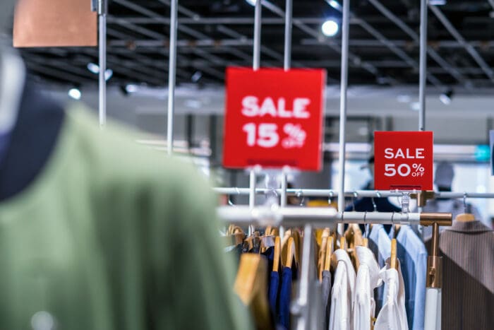 Clothing store sale with discounts.