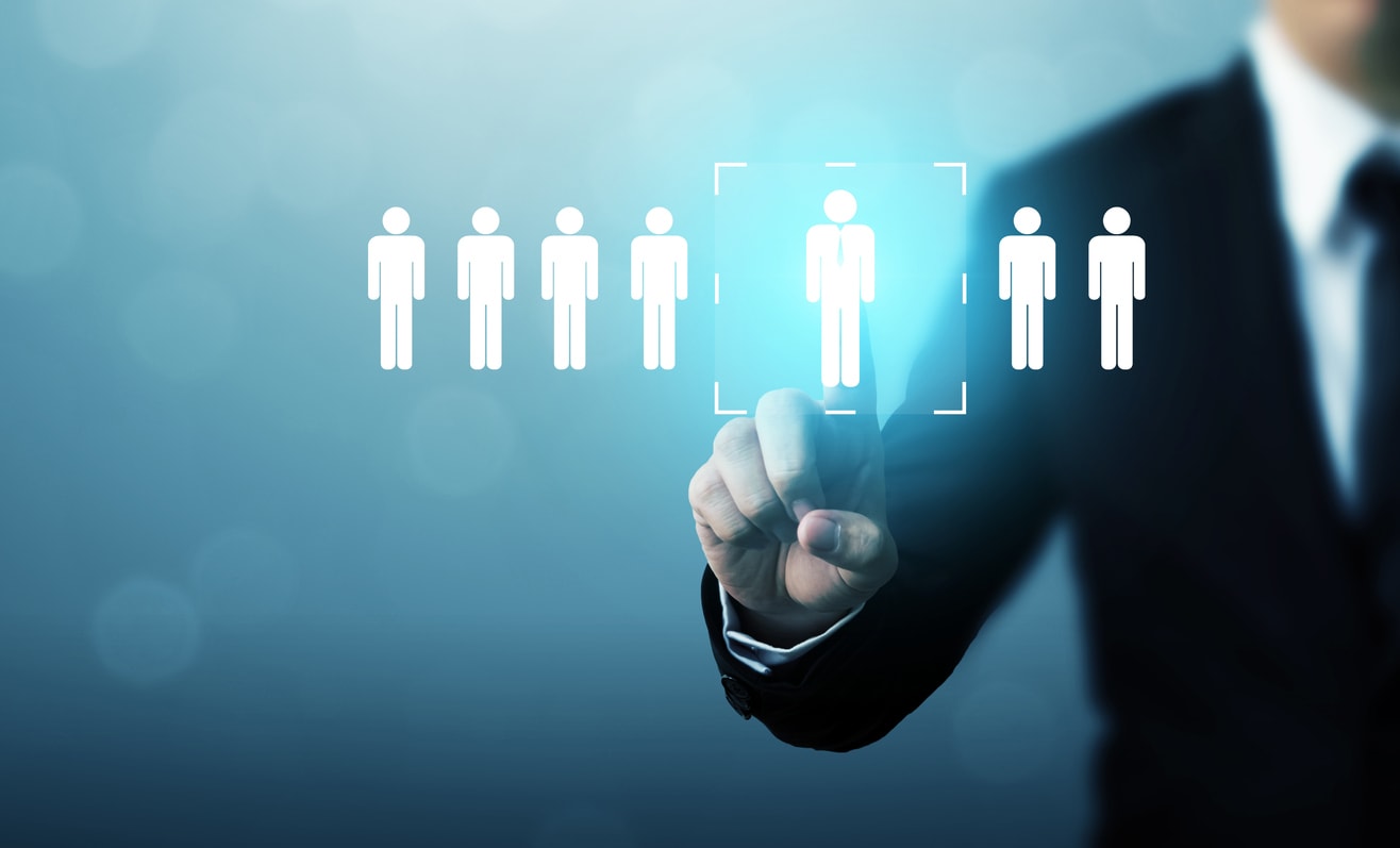 Businessman selecting virtual personnel icon on screen