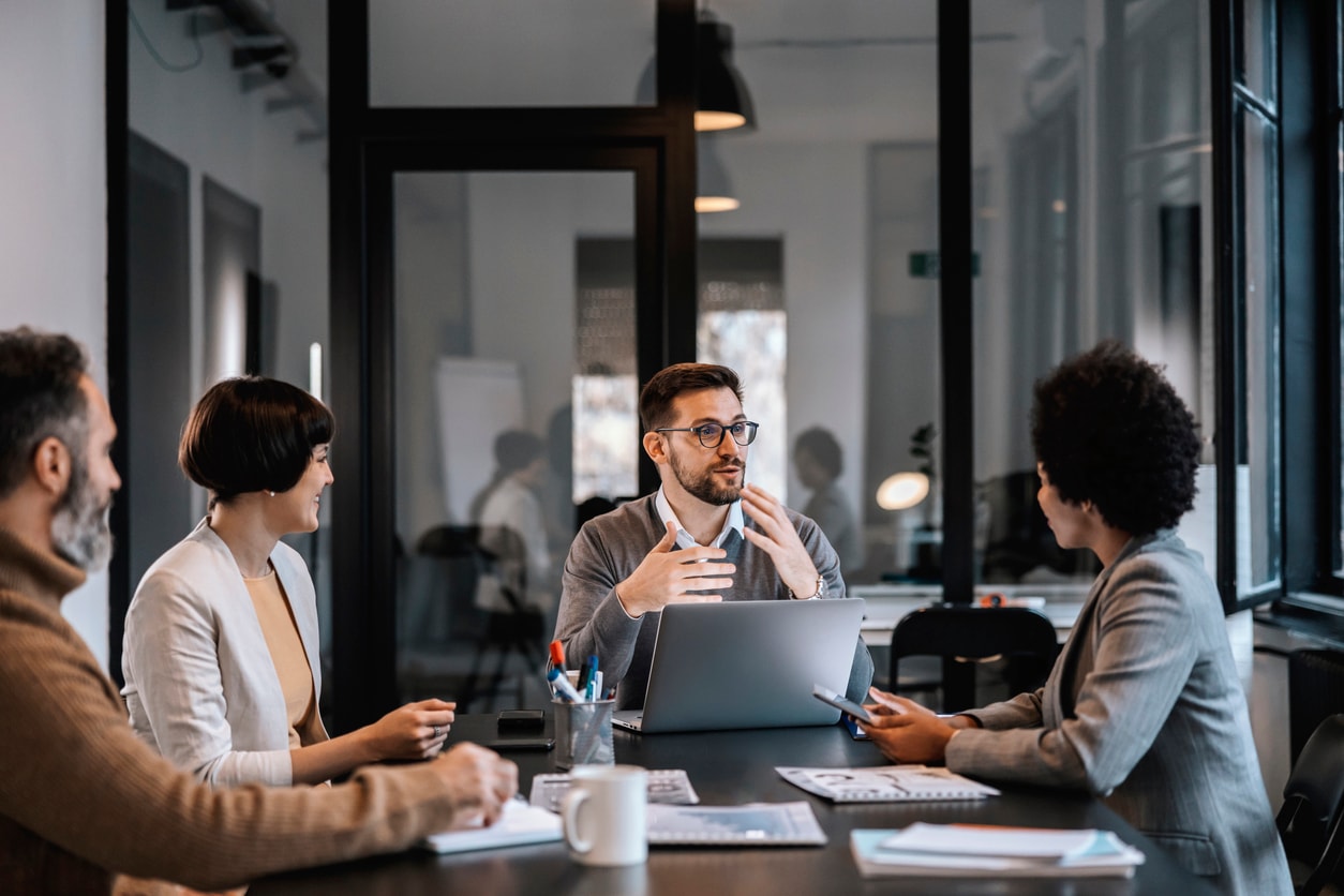 Business team discussing project in modern office