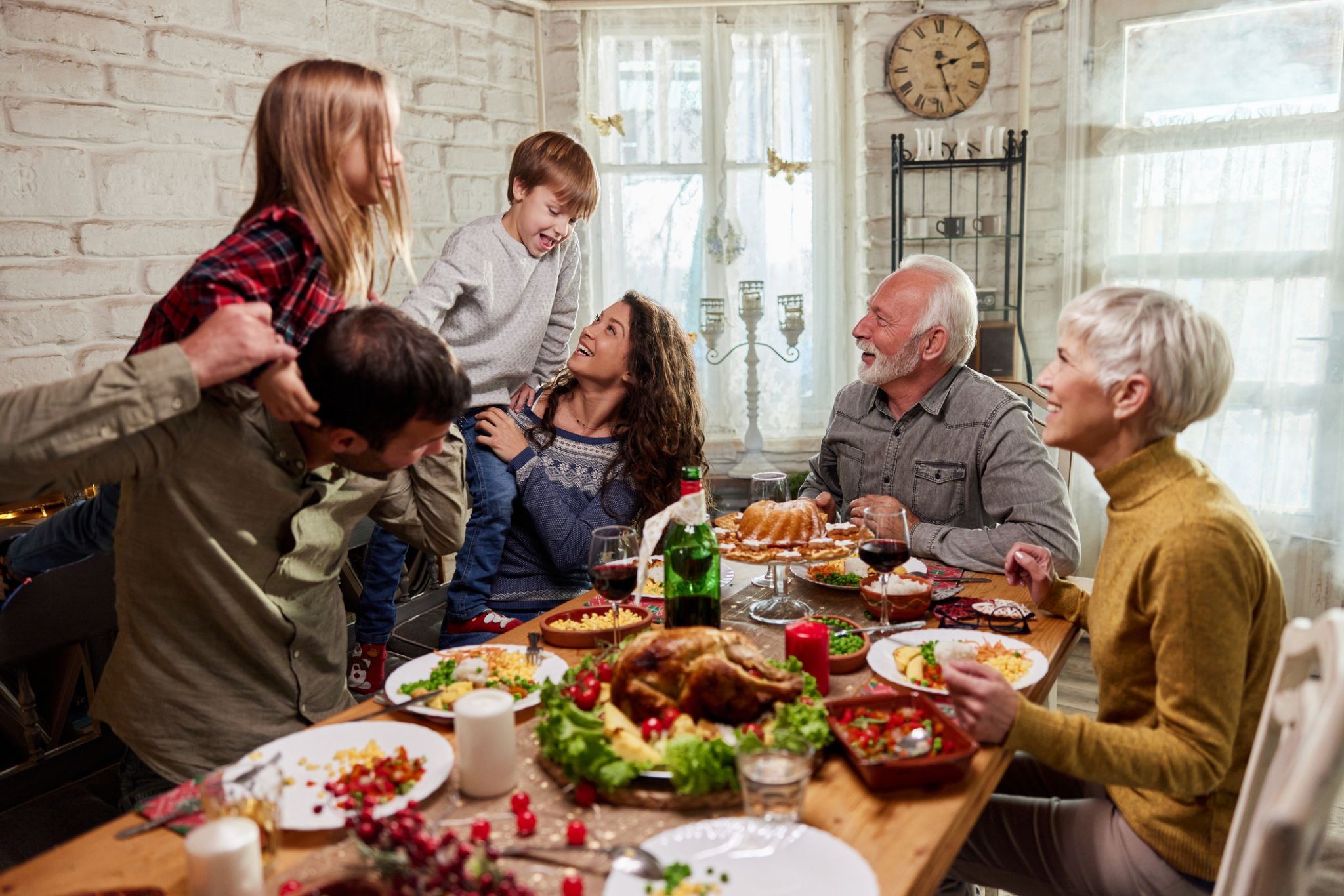 Multi-generational family enjoying festive dinner together